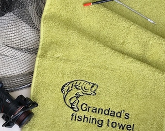 Fishing towel 100% soft cotton towelling handy size available in five colours ,with fish design or fish design with personalised text