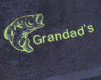 Fishing towel 100% soft cotton towelling handy size available in five colours ,with fish design or fish design with personalised text