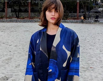 Limited edition Blue Rothko reversible kimono in shades of beige and navy blue with a boxy shape and pockets