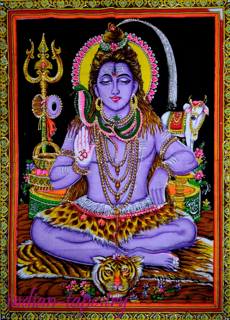 May include: A colorful tapestry depicting the Hindu deity Shiva, seated in a meditative pose with a snake around his neck. He is adorned with jewelry and a tiger skin. A white cow and a trident are also depicted in the image.