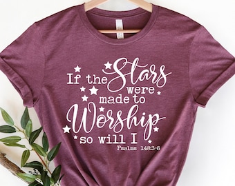 May include: A maroon t-shirt with white text that reads "If the Stars were made to Worship so will I" and "Psalms 148:3-6".