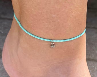 Dainty Stretchy elastic anklet made with Miyuki delicas, sterling silver oval jump ring and tiny shell charm