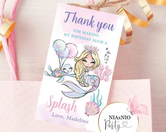 May include: A pink and purple thank you tag with a mermaid illustration, balloons, and a turtle. The tag says "Thank you for making my birthday such a splash. Love, Madeline." and has a logo that says "Niaxnio Party".