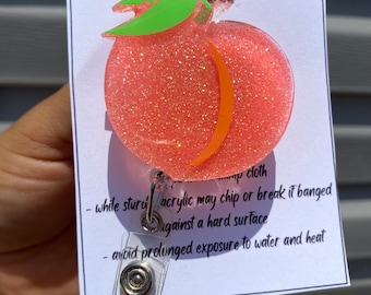 Peach badge reel