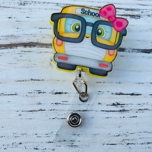 School bus badge reel