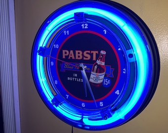 Pabst Cinta Azul PBR en Botellas Cerveza Bar Publicidad Hombre Cueva Azul Neón Reloj de Pared Signo