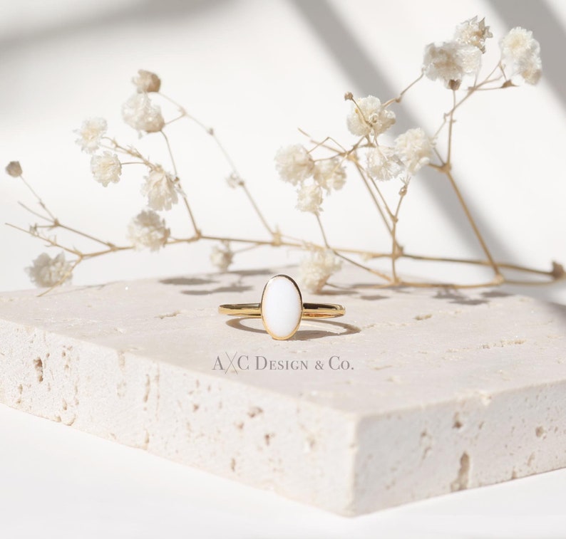 oval breastmilk ring in 18k gold