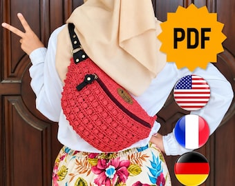 May include: A bright red crocheted fanny pack with a black zipper, black leather-like strap, and a circular logo patch. The image includes a yellow starburst shape with the text PDF and circular icons of the US, French, and German flags.