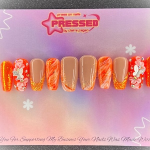 Druk op de nagels oranje Flutterbye