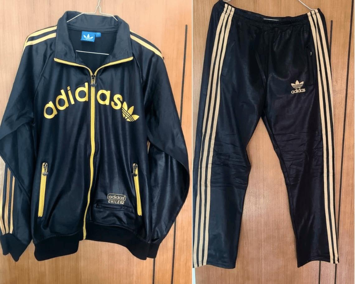 Adidas tuta nera e oro sale