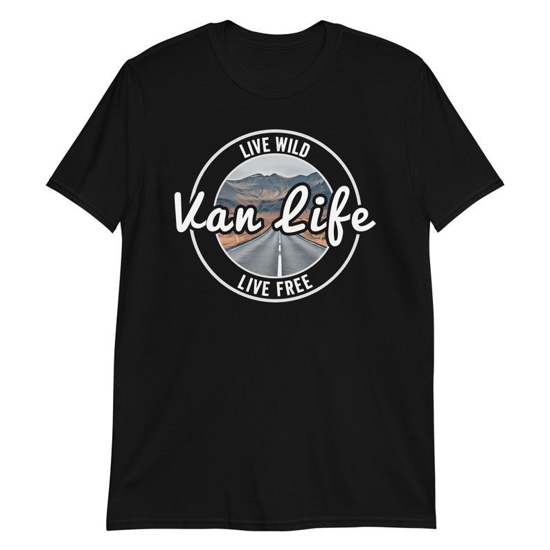 May include: Black t-shirt with a white circle graphic that says "Live Wild Van Life Live Free" with a picture of a road in the mountains.