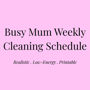 May include: A pink background with the text "Busy Mum Weekly Cleaning Schedule" in black. Below the title are the words "Realistic. Low-Energy. Printable."