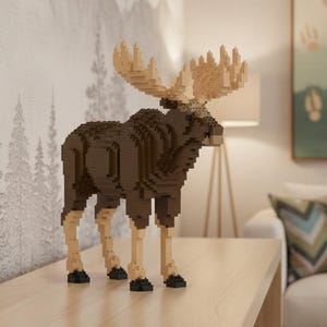 May include: A brown and tan moose sculpture constructed from small blocks. The moose features large antlers and stands on a light-coloured wooden surface. The sculpture is in a room with a mountain mural and a painting.