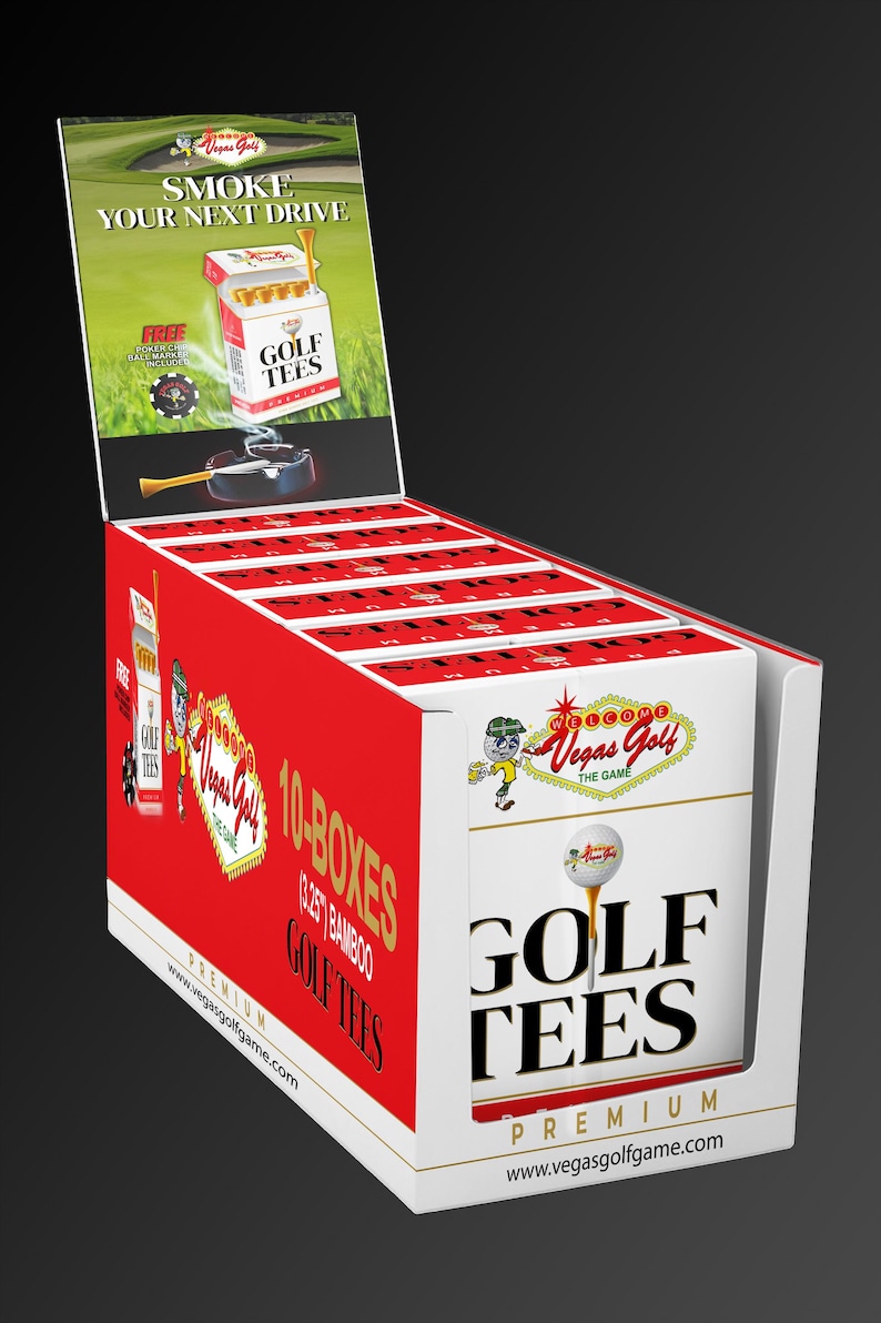 May include: Display box of Vegas Golf golf tees. The box is red and white with the text "GOLF TEES" and "PREMIUM". The display also features the text "SMOKE YOUR NEXT DRIVE".
