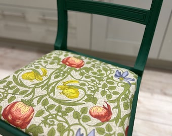 Upcycled coloured dining chairs with seat pads