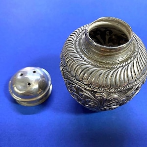antique silver salt or pepper shaker is handmade, one piece.