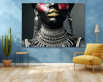 May include: A close-up of a woman's face with gold and pink makeup. She is wearing a large silver and black beaded necklace.