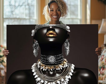 May include: A black art print featuring a stylized portrait of a woman with gold lips and elaborate silver jewelry. The woman is wearing a headpiece, earrings, and multiple necklaces. The print is held by a person in front of a window.