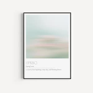Könnte beinhalten: Ein minimalistisches Poster mit einem verschwommenen Bild einer hellgrünen und rosafarbenen Landschaft. Der Text "SPRING" ist in Schwarz am unteren Rand des Posters geschrieben, mit der Definition "[spring] noun a season of new beginnings, rainy days, and blooming flowers."