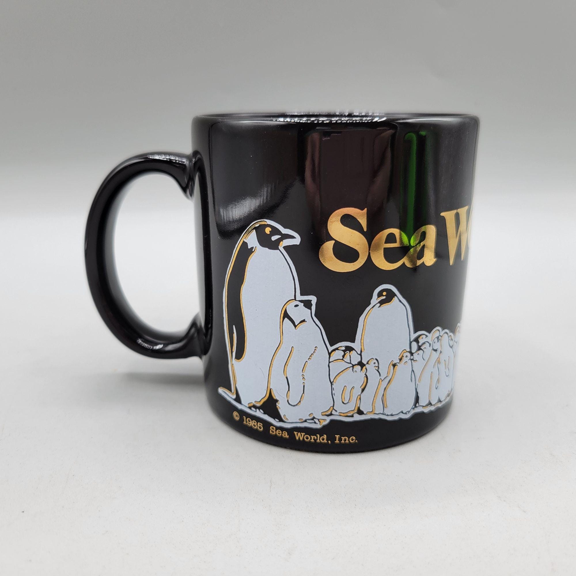Vintage 1991 Sea World Black Ceramic Mug With Gold Logo Penguin Whale  Graphics - Etsy