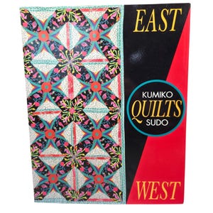 May include: A book cover featuring a colorful quilt pattern with floral designs in pink, teal, and red on a white background. The book's title is "Kumiko Quilts Sudo" with the words "EAST" and "WEST" on the cover.