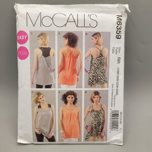May include: A sewing pattern for a sleeveless top with a variety of neckline and back options. The pattern is for sizes 18W-20W-22W-24W and is from McCall's pattern number M6359.