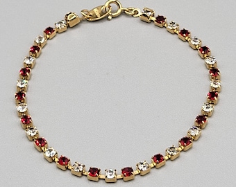 Avon Tennis Bracelet Red CZ Crystal Rhinestone Gold Tone Spring Ring Clasp