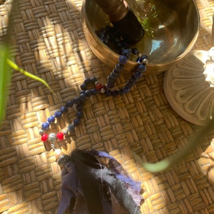 Lapis lazuli and Ruby mala hand knotted with fabric tassel