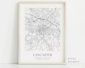 May include: A black and white map print of Lancaster, Pennsylvania with the city's coordinates and the word "modern" in the bottom right corner.