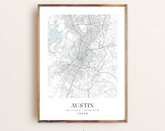 May include: A black and white map print of Austin, Texas with the city name and coordinates in the bottom right corner. The text "modern" is below the map and a website address is below that.