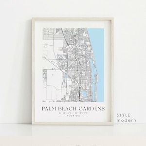 May include: A black and white map of Palm Beach Gardens, Florida, with a light blue background. The map shows the city's streets and landmarks. The text "PALM BEACH GARDENS" is printed in black at the bottom of the map, along with the city's coordinates and the word "FLORIDA". The text "STYLE modern" is printed in black in the bottom right corner of the map.