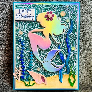 Iridescent Silver Mermaid Silhouette Birthday Card with Glitter Swirly Wave Background and Seafloor Design
