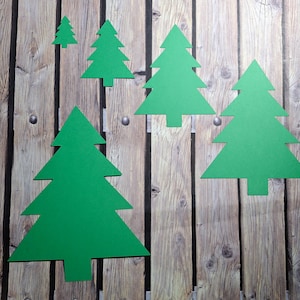 May include: A set of three ceramic mugs with a speckled, matte finish. The mugs are in shades of cream, light gray, and dark gray. Each mug has a simple, minimalist design, perfect for coffee or tea.