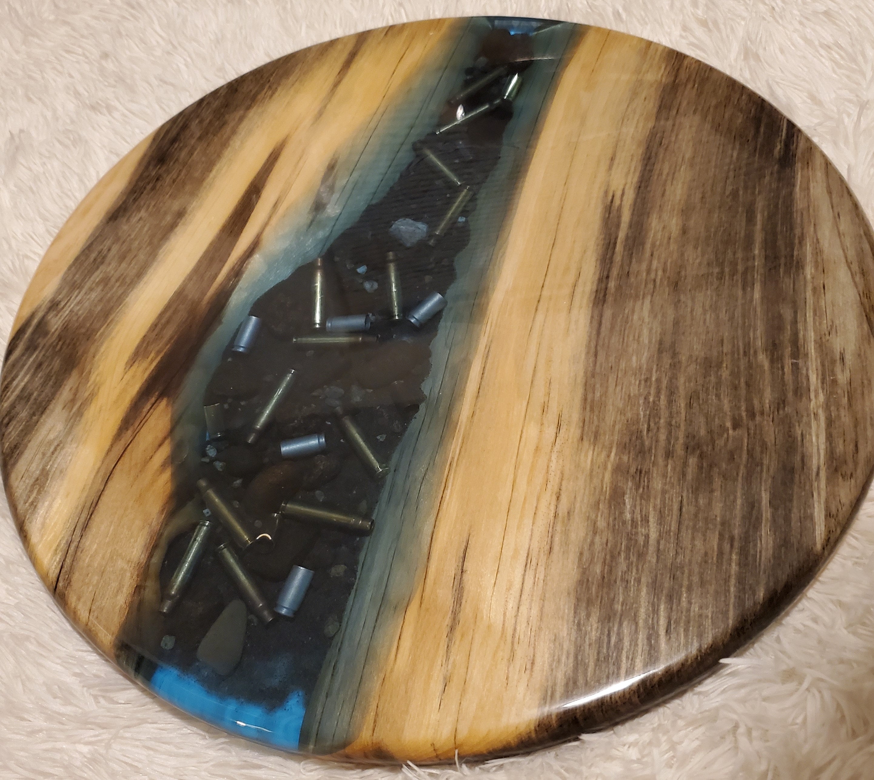 Epoxy wood outlet table with bullets