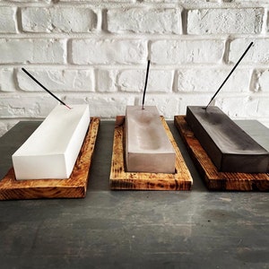 Concrete incense burner on wooden or cork base