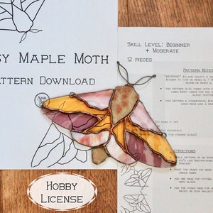 May include: A stained glass pattern for a maple moth, with 12 pieces. The pattern is printed on paper and includes instructions for cutting and assembling the glass. The pattern is for a beginner to moderate skill level.