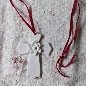 Handmade white ceramic cross pendant