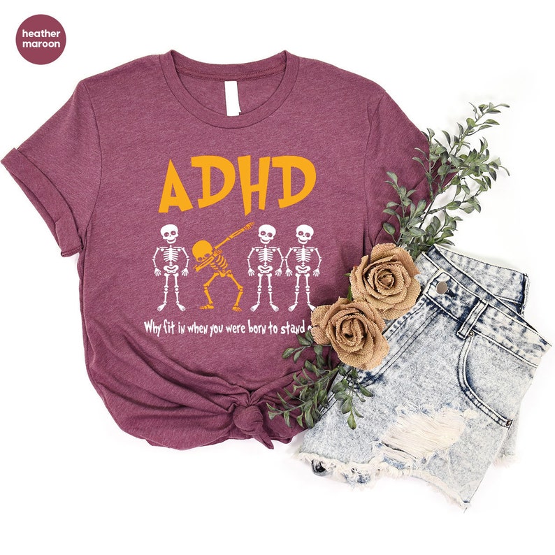 a t - shirt that says adhd with skeletons on it