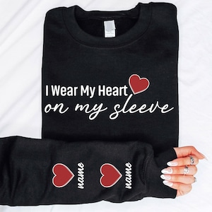 I Wear My Heart On My Sleeve Sweatshirt, Mothers Day Shirt, Mama Sweatshirt with Kids Name on Sleeve, Personalized Mother Day Gift for Mom