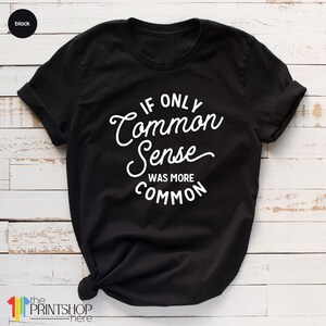 Peut inclure: T-shirt noir avec un texte blanc qui dit "Si seulement le bon sens &eacute;tait plus courant".