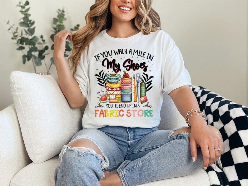 a woman sitting on a couch wearing a white shirt
