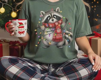Funny Christmas Raccoon T-Shirt, Funny Holiday Animal Graphic Tee, Festive Raccoon with Lights Sweatshirt, Winter Animal Lover Tee