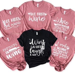 a group of women's t - shirts with sayings on them