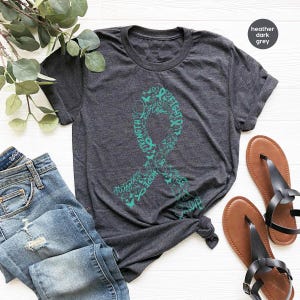 Concientización sobre el cáncer de ovario, camisetas con cuello en V para el cáncer de ovario, camisetas con estampado de lazo, regalo para sobrevivientes de cáncer de ovario, camisetas con cuello en V para pacientes con cáncer. imagen 3