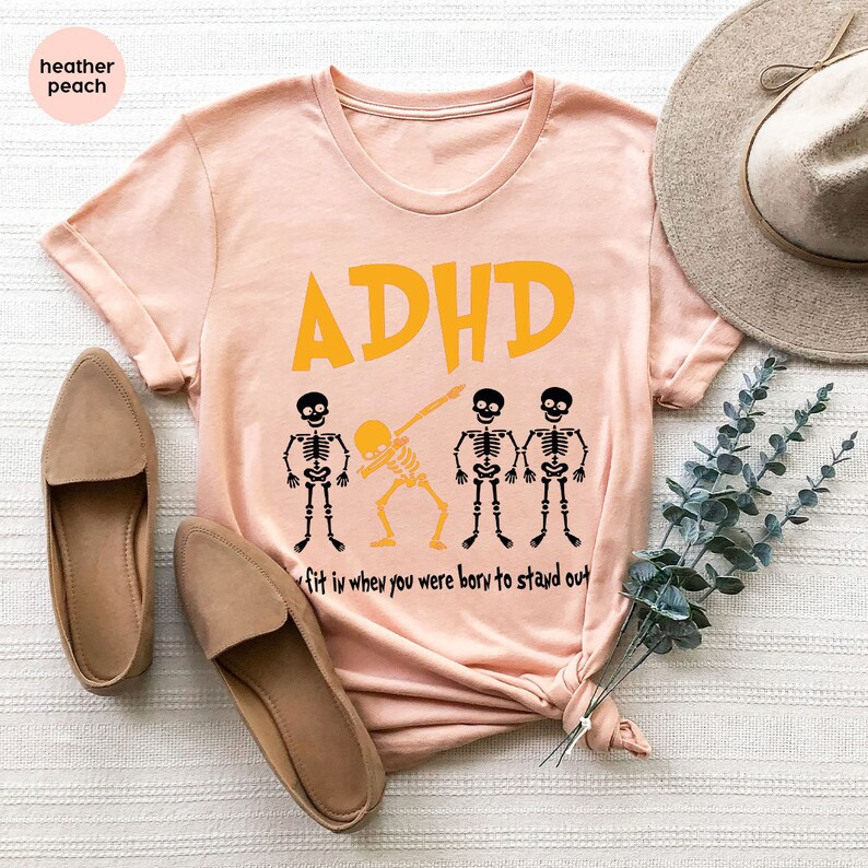 a t - shirt that says adhd with skeletons on it