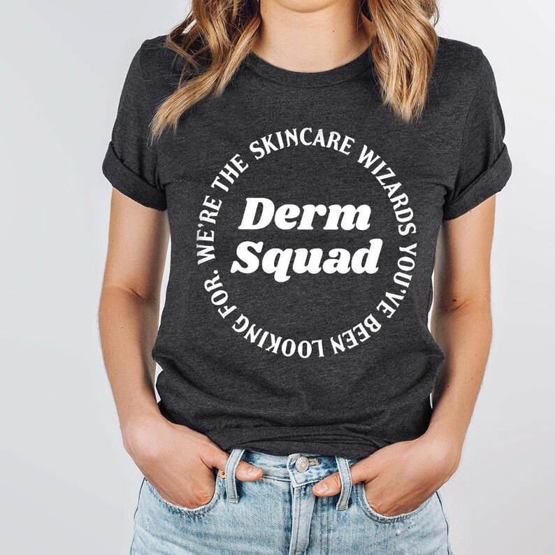 a woman wearing a black shirt that says derm squad