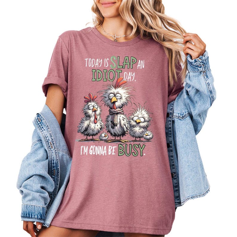 a woman wearing a t - shirt that says, today is slap an idiot day