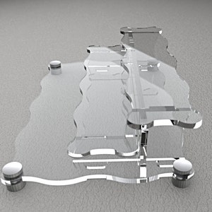 Pode incluir: Um suporte de vidro transparente de dois n&iacute;veis com uma borda ondulada. O suporte tem quatro p&eacute;s de metal prateado.