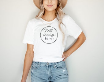 May include: A white t-shirt with a black circle and the text "your design here" in the center.