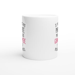 May include: White ceramic mug with black text that reads "Je ne suis pas parfaite mais je suis grave et press&eacute;e".
